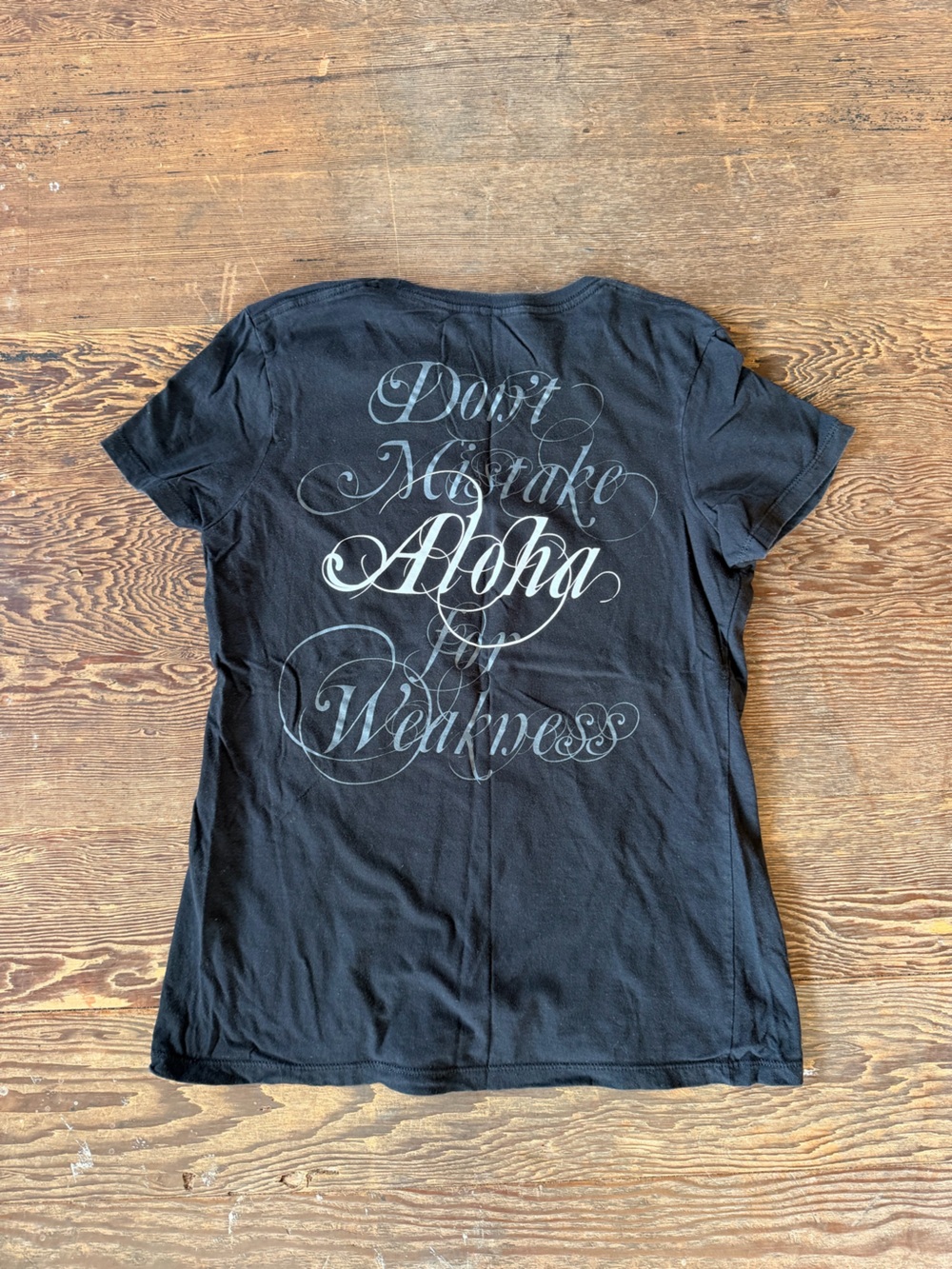 Hawaii's Finest Black Tee with White Script 'Aloha'